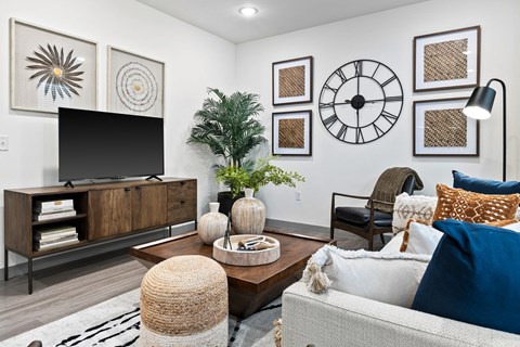 a living room with a couch and a tv